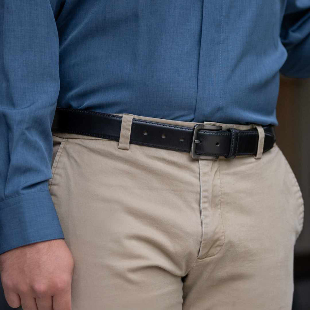 Image of Metro Black Leather Belt on model wearing blue shirt and khakis. Hypoallergenic