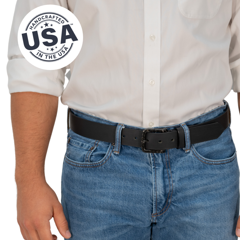 Image of model wearing Black leather belt with black carbon fiber buckle.  Made in USA