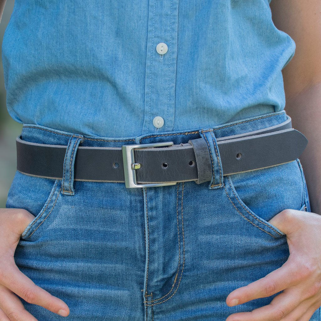 Square Wide Pin Distressed Leather Belt on female model. Thinner 1⅜ inch strap great with jeans