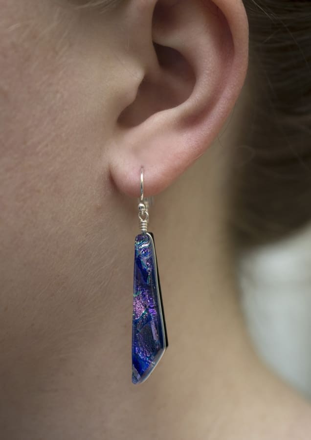 Purple dichroic glass earrings have pinks and silver too mixed in color.  Silver French hook.  