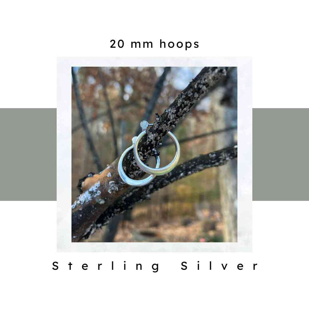 20 mm sterling silver hoop earrings by Nickel Smart on a branch. Hypoallergenic, nickel free.
