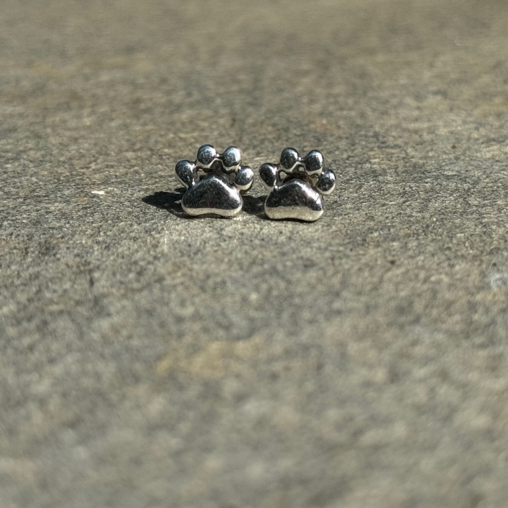 Pawsitively Perfect Paw Earrings. Small cat or dog footprint studs made from sterling silver.