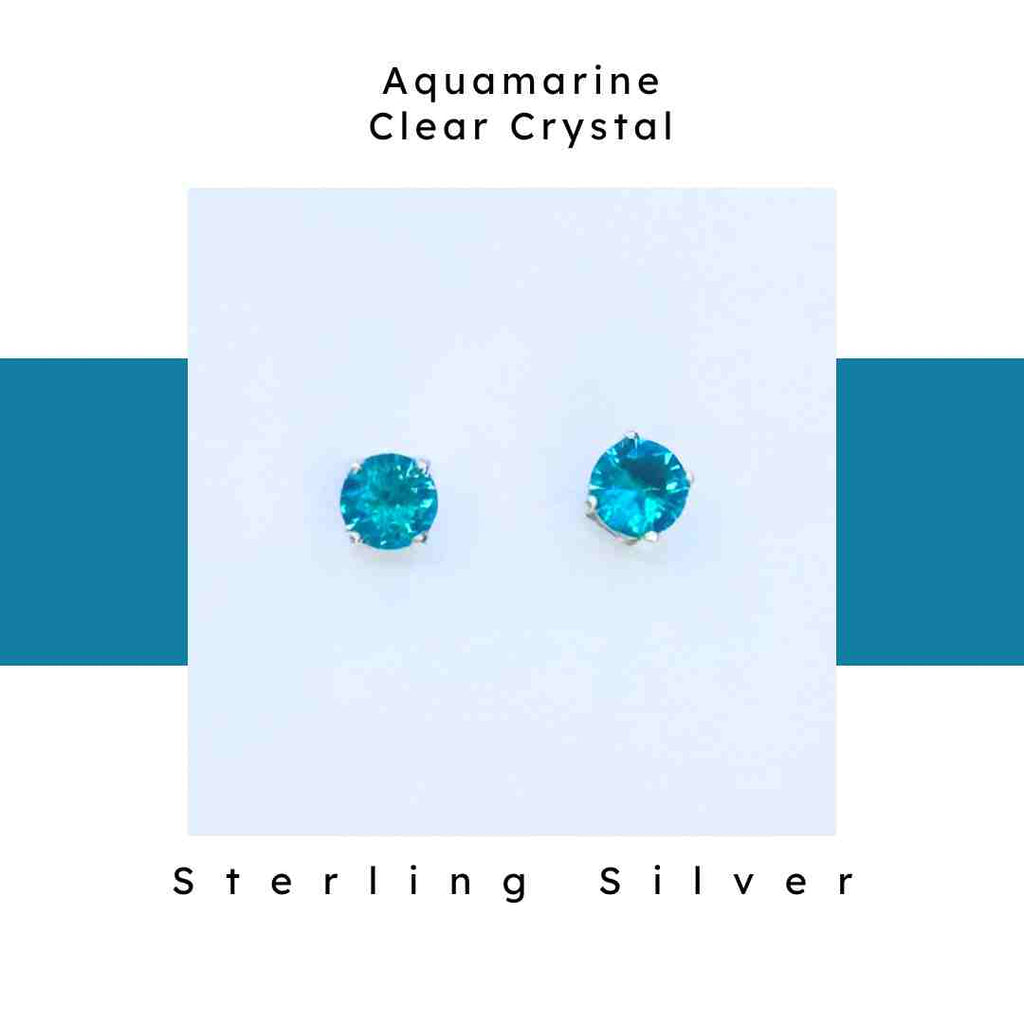 Aquamarine Clear Crystal. Sterling Silver. Small round blue studs with silver hardware.