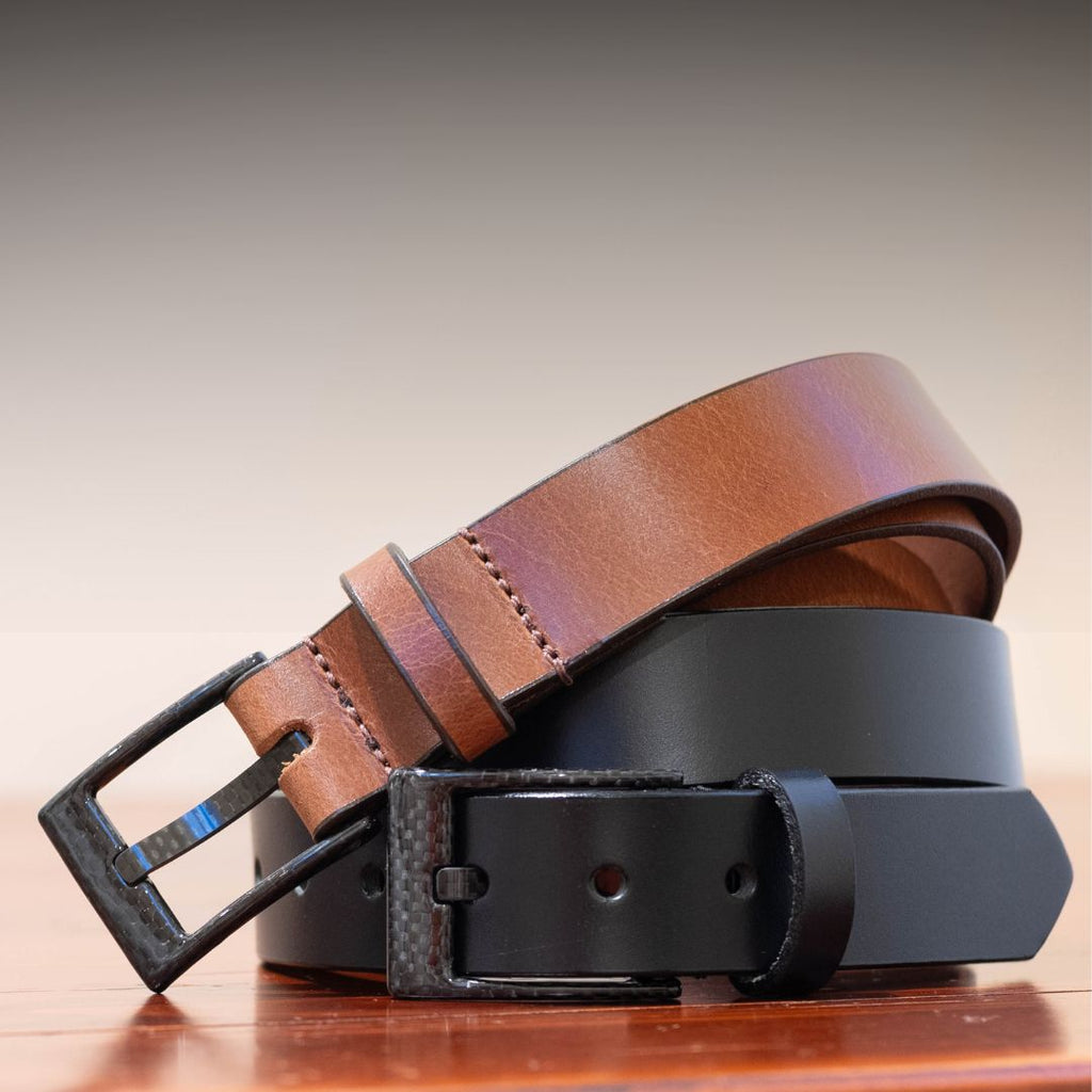 One black and one brown belt, both with black carbon fiber buckles sewn on