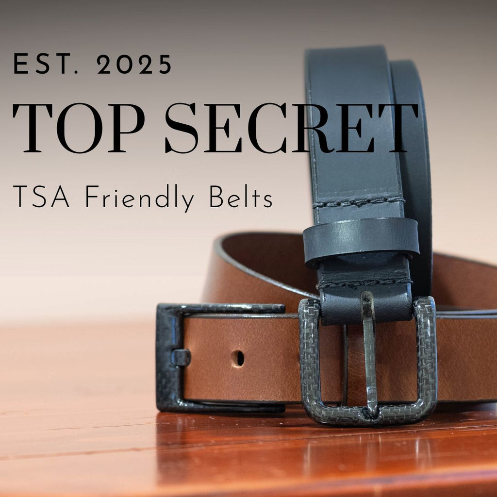 Brown belt and black belt with black buckles on a wooden surface. Est. 2025. Top Secret. TSA Friendly Belts.