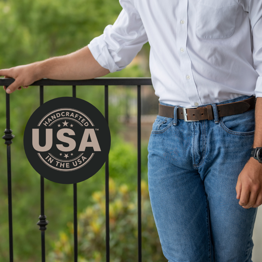 Caraway Mountain Distressed Leather Brown Belt on a model in jeans. Handcrafted in the USA.