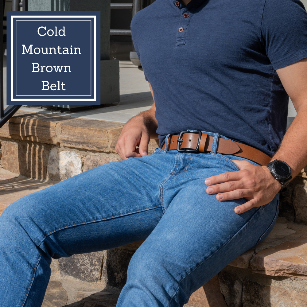 Image of model wearing Cold Mountain Brown Belt. Unique black buckle with bottle opener feature
