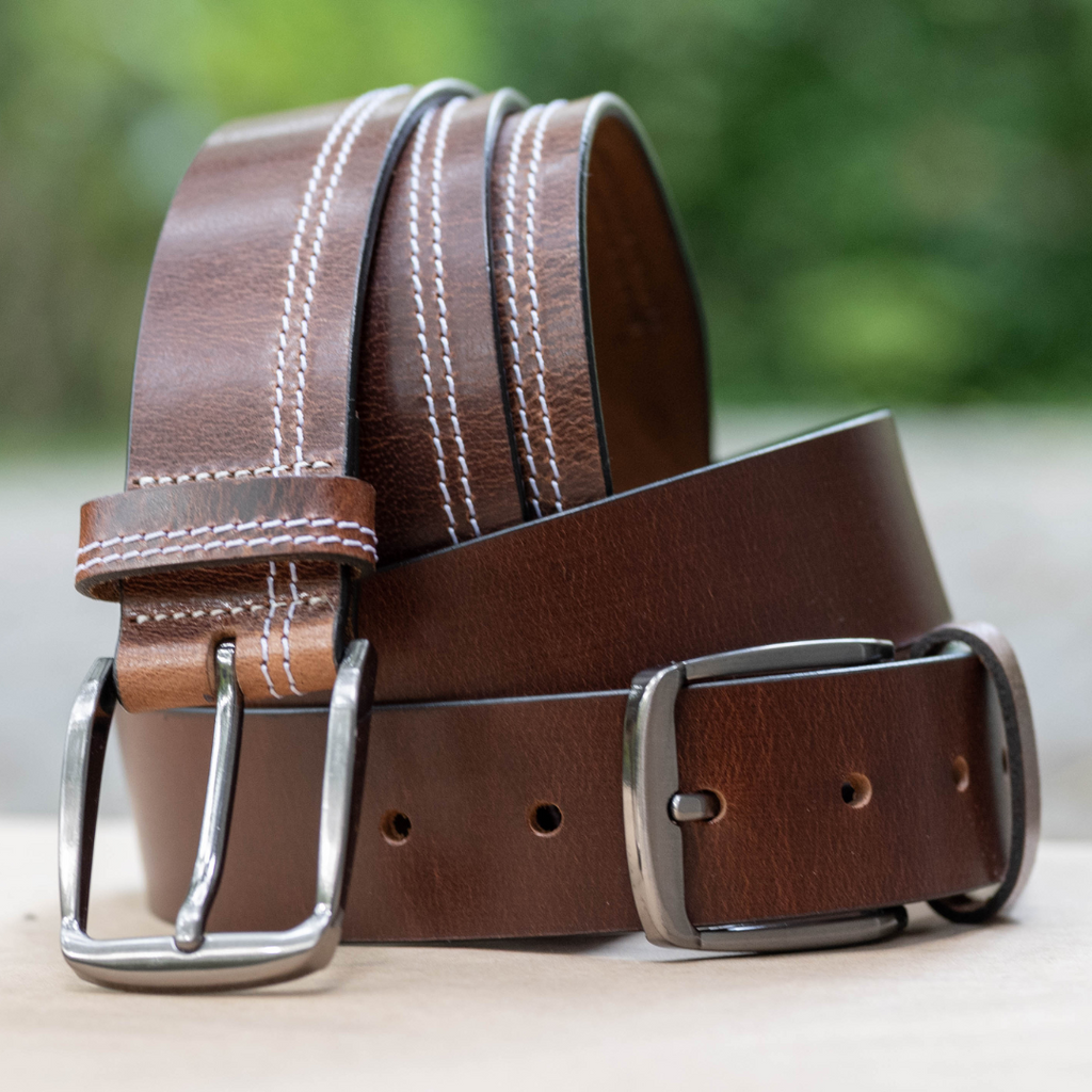 Millennial Brown and Brown Stitched Leather Belt Set. Outdoor setting. Glossy full grain leather.