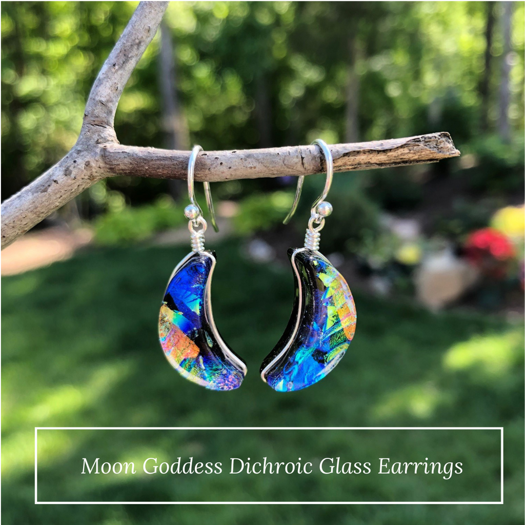 Moon Goddess Earrings showing a mix of colors like blue, orange, yellow and purple. Crescent shape