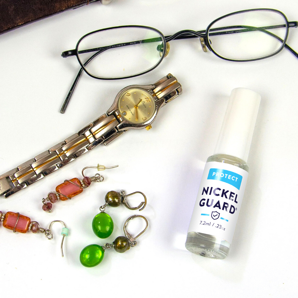 Watch, earrings, eye glasses all coated with Nickel Guard so they can be worn without a rash.