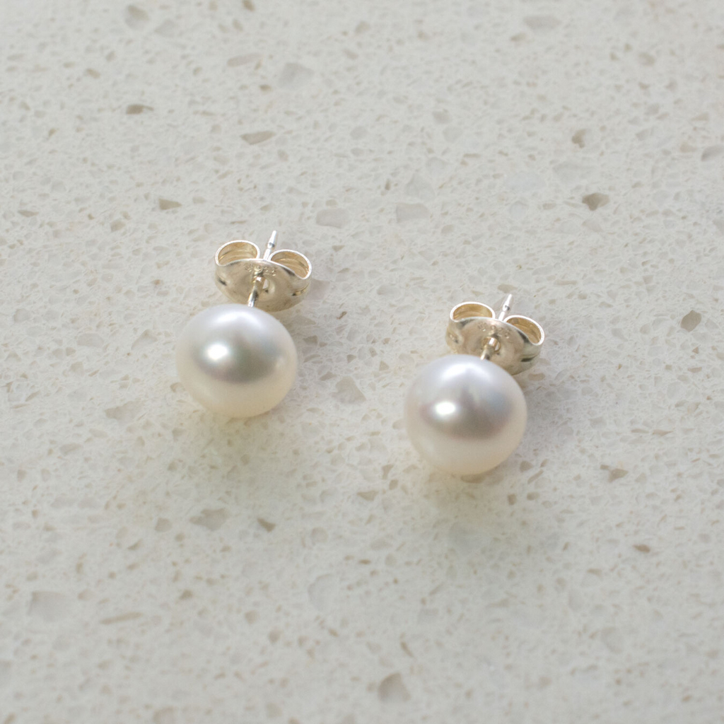 Magnolia Freshwater Pearl Post Earrings by Nickel Smart®. White pearl posts on sterling silver backs