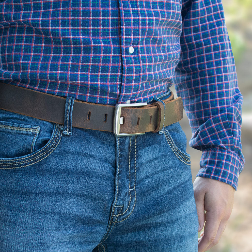 Titanium Wide Pin Distressed Leather Belt on a model. Casual distressed leather, great with jeans