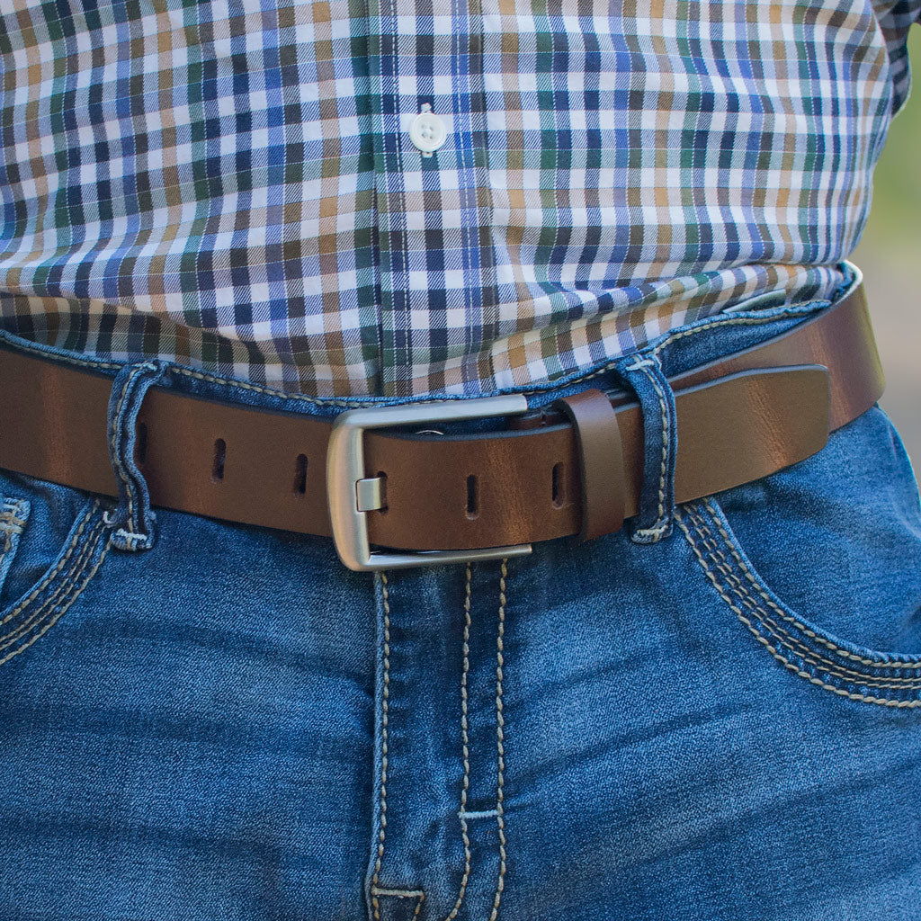 Brown Wide Pin Belt on model in jeans. Casual belt, lightly distressed leather, substantial buckle