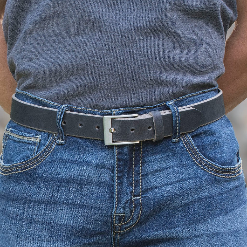 Square Wide Pin Distressed Leather Belt on male model. Casual dark gray strap with raw edges