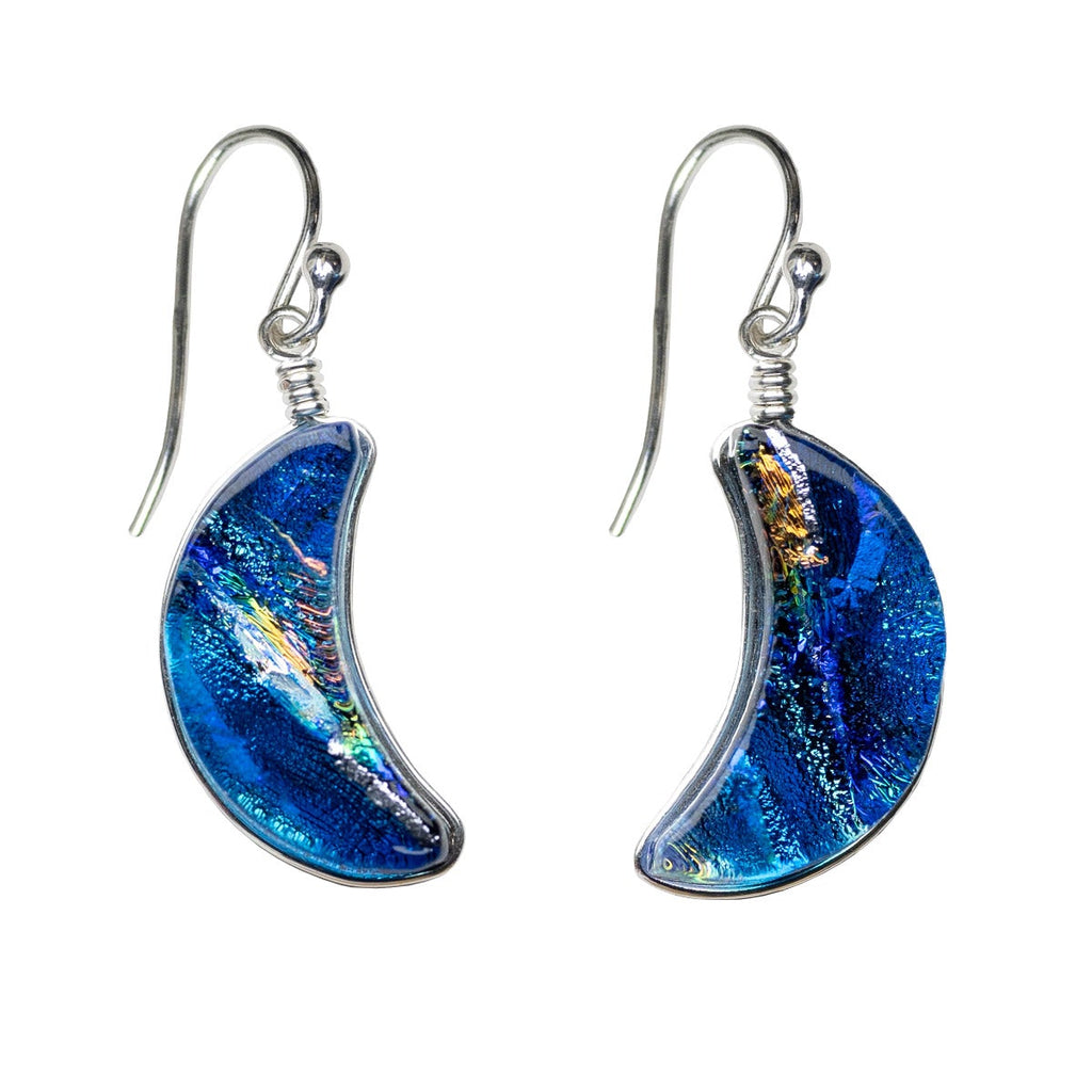 Crescent shaped earrings made from blue dichroic glass. Hypoallergenic and Nickel Free Earrings