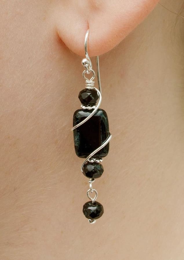 Cape Hatteras Earrings. 1.75 inches long, silver wire wrapped around black glass, silver French hook