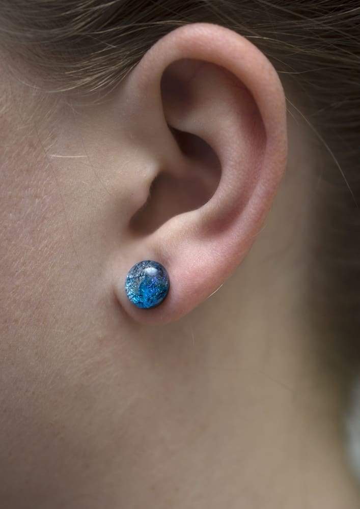 Cosmic Earrings on model. blue dichroic glass dots are 4 mm - 6 mm on hypoallergenic posts.