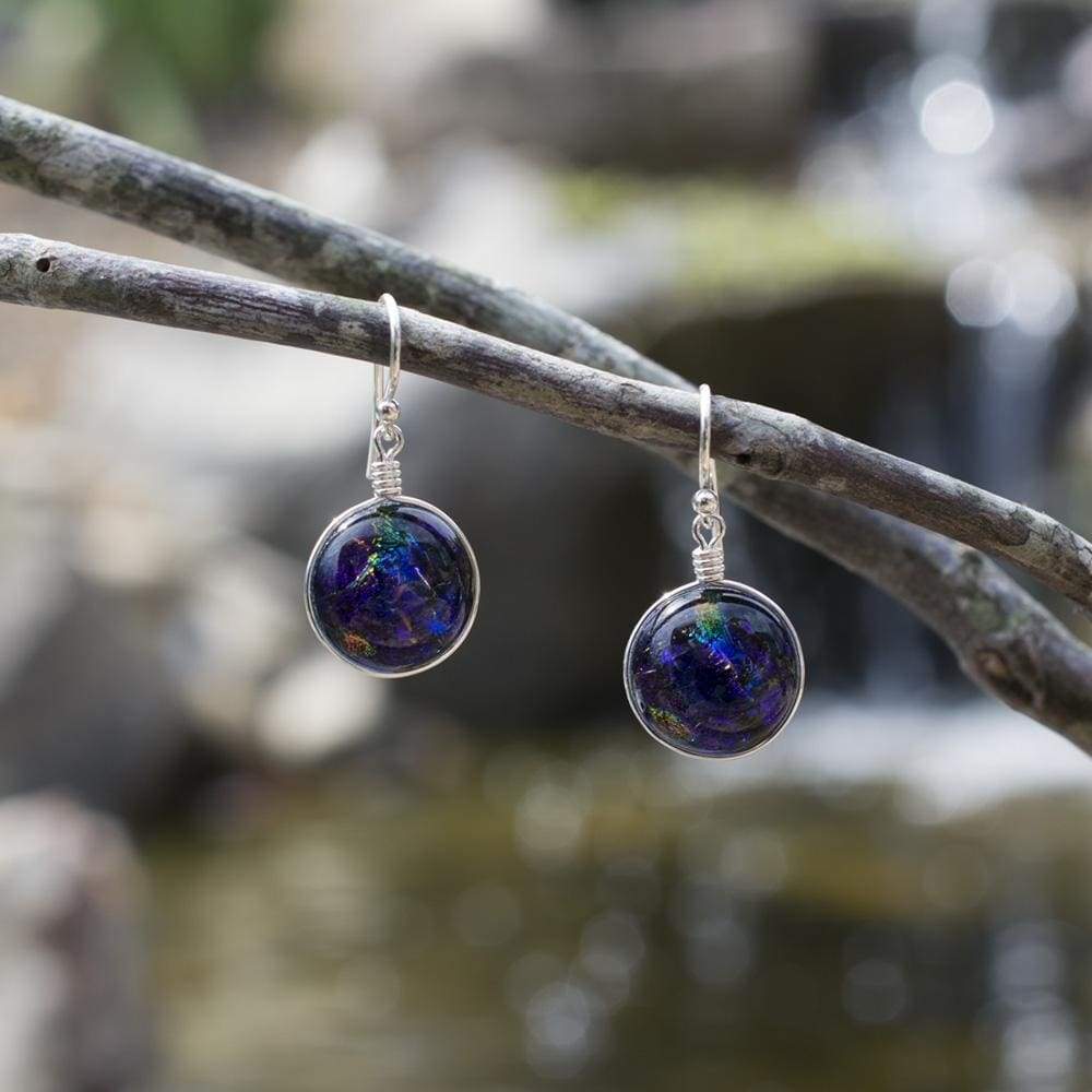 Purple dichroic glass with a mix of other colors.  Silver French hooks. Jupiter Earrings