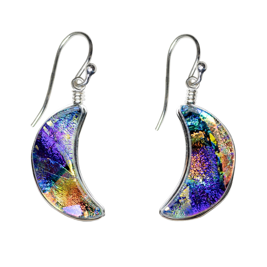 Moon Goddess crescent shaped dichroic glass earrings showing pink, blue, purple and yellow. USA