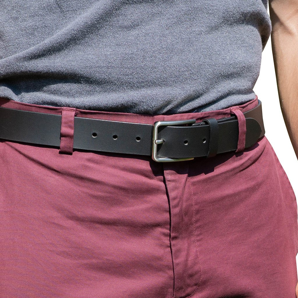 Slick City Black Leather Belt on a model. Fits in with dress, dress-casual, or casual outfits.