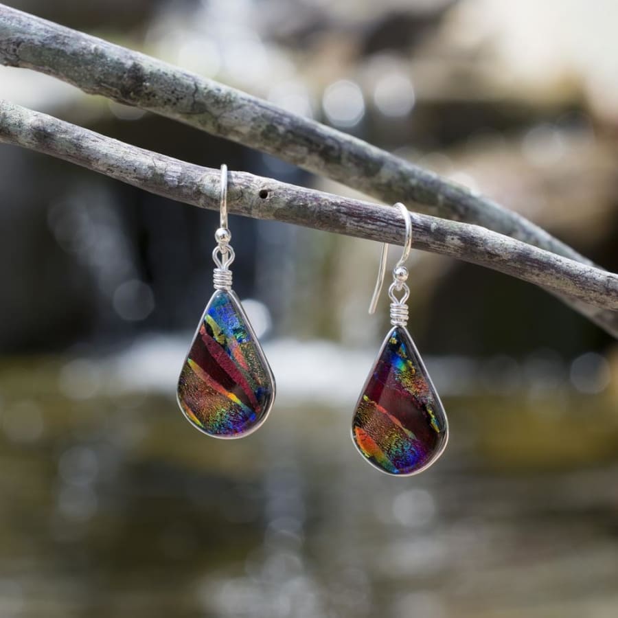 Tear drop shaped red glass earrings with a mix of other colors.  Silver French hook. Rainbow Falls
